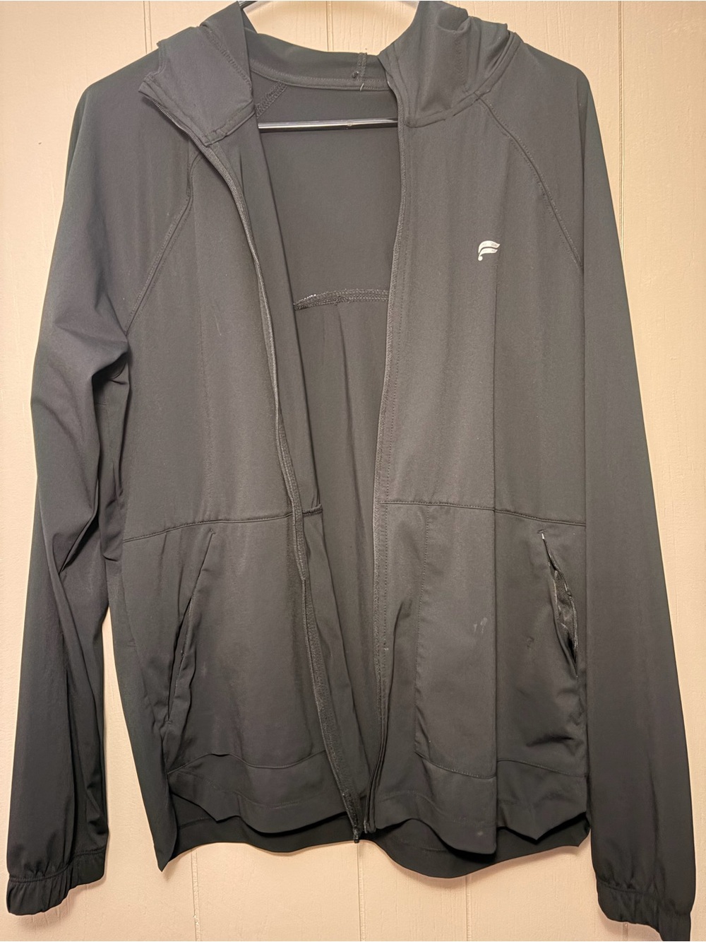 Fabletics The One Jacket 
(Has no zippers)